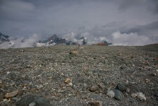 Cindy standing in the middle of rocks where less than 50 years ago was still a glacier