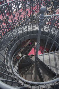 Spiral stairs down to the street.