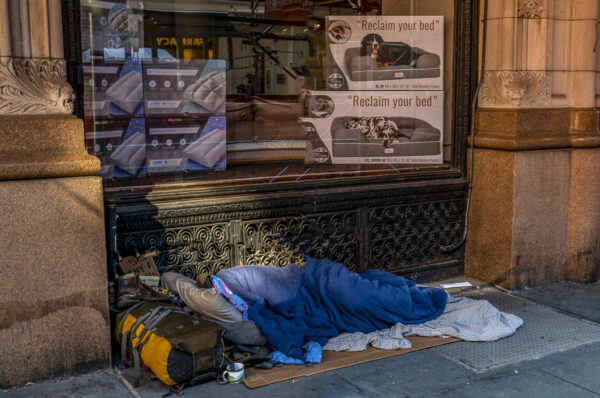 SADLY, I saw this man every morning in front of the mattress store.