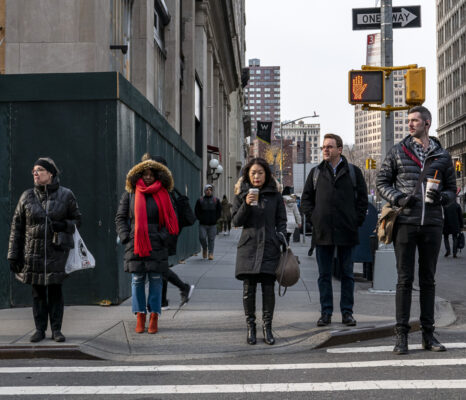 Lined up to cross the street.